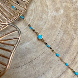 bracelet doré et bleu