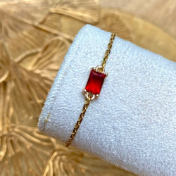bracelet doré connecteur rouge